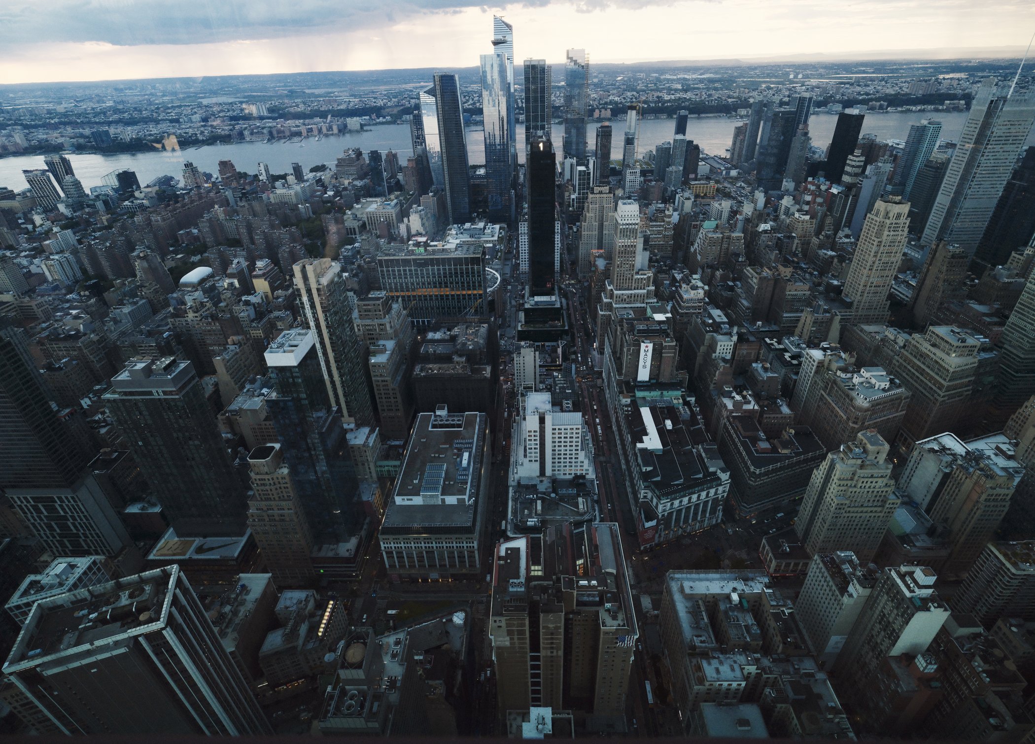 Aerial view across Manhattan toward Hudson Yards and the Hudson River