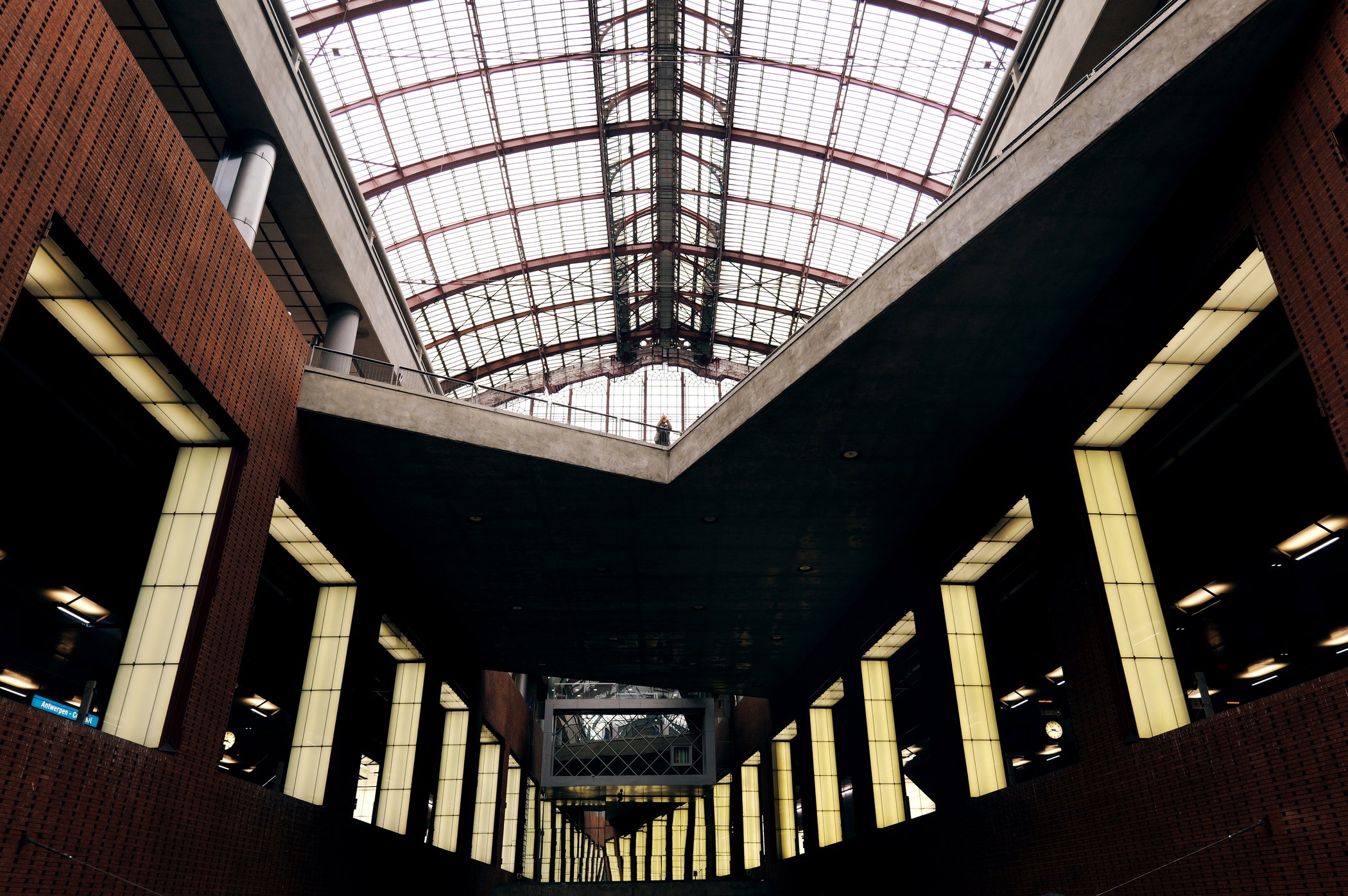 Symmetrical station architecture and illuminated columns