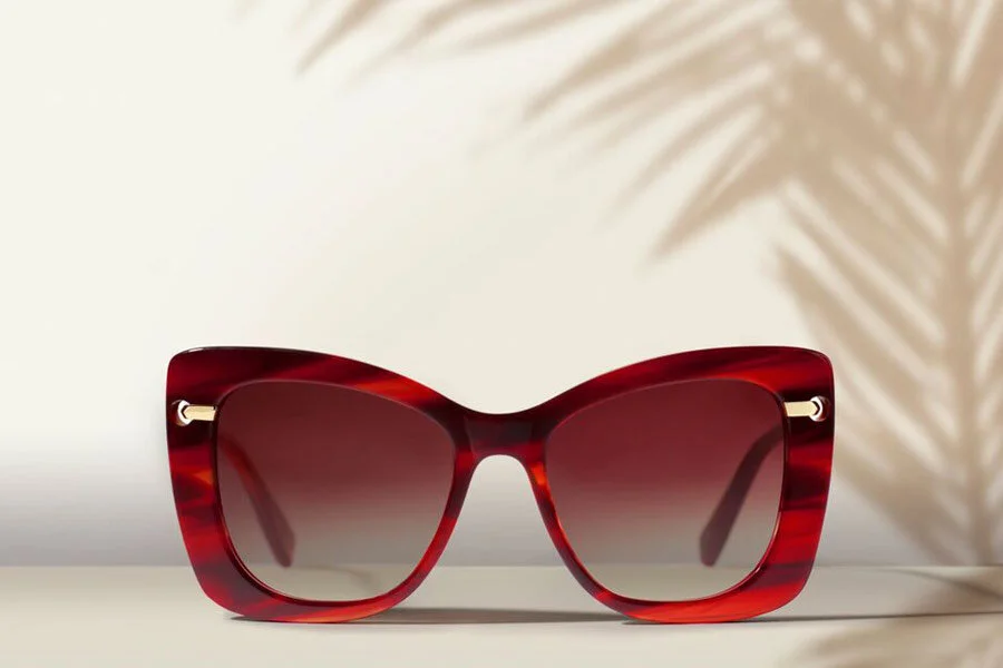 Red eyewear frame product photograph